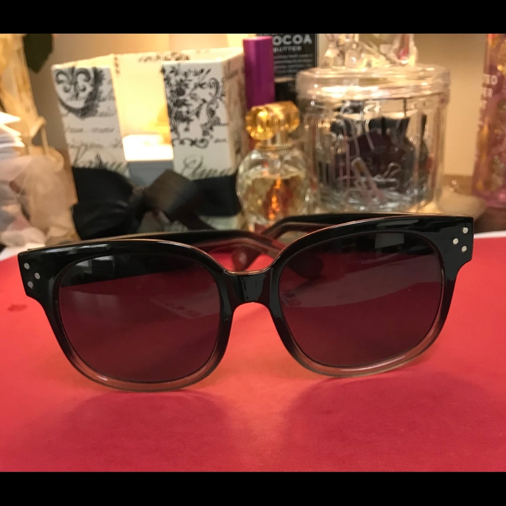 Vince Camuot sunglasses.